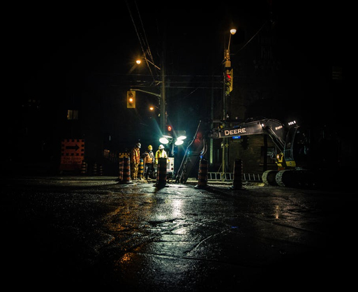 Construction workers at night